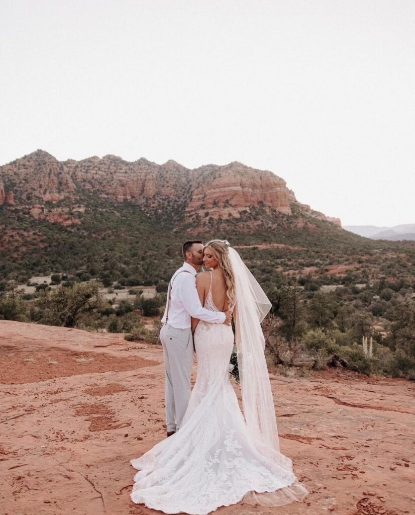 Desert wedding with bridal gown from New Beginnings Bridal Studio.